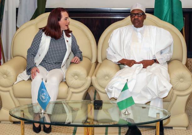 The President of the United Nations (UN) General Assembly Maria Fernanda Espinosa (L) discusses with Nigerian President Mohammadu Buhari at the presidency in Abuja on May 7, 2019. - Espinosa is in Nigeria to discuss issues relating to insecurity, transition arrangement together with the challenges of development and environmental protection with the Nigerian authourities. "This (visit) is very timely especially considering that the next President of the General Assembly is going to be Nigeria," she told journalists on its arrival at the Abuja airport. (Photo by SUNDAY AGHAEZE / AFP)        (Photo credit should read SUNDAY AGHAEZE/AFP via Getty Images)